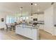 Modern kitchen with stainless appliances, granite counters, and pendant lighting at 4324 Dairy Ct, Lakewood Ranch, FL 34211