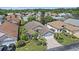 An aerial view of a charming single-Gathering home surrounded by mature trees and lush landscaping at 4330 Beekman Pl # 103, Sarasota, FL 34235
