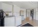 Spacious garage with new washer and dryer units installed, offering convenience and practicality at 4330 Beekman Pl # 103, Sarasota, FL 34235
