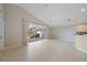 A bright living room features an open concept with access to a screened lanai at 4330 Beekman Pl # 103, Sarasota, FL 34235