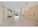 The spacious living room features high ceilings and access to the outdoor living space at 4330 Beekman Pl # 103, Sarasota, FL 34235