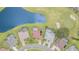 Direct aerial view of homes next to the pond and golf course with private pools at 4330 Presidential Avenue E Cir, Bradenton, FL 34203