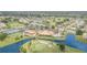 Aerial view of the community recreation center with golf courses, ponds, tennis courts, and pools at 4330 Presidential Avenue E Cir, Bradenton, FL 34203