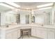 Spacious bathroom features dual sinks, great lighting and makeup vanity at 4330 Presidential Avenue E Cir, Bradenton, FL 34203