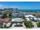 Beautiful elevated view of single Gathering home and manicured landscaping near the ocean at 444 S Polk Dr, Sarasota, FL 34236