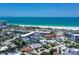 An aerial showcases the property's proximity to beach, with lovely landscaping and neighborhood charm at 444 S Polk Dr, Sarasota, FL 34236
