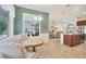 Bright eat-in kitchen with granite counters, stainless appliances, and views of the lush backyard at 4714 Seneca Park Trl, Bradenton, FL 34211