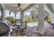 Relaxing screened lanai with outdoor dining, a barbecue grill and pool views at 4714 Seneca Park Trl, Bradenton, FL 34211