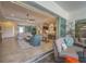 Open concept living area with sliding glass doors and seamless transition to the outdoors at 4714 Seneca Park Trl, Bradenton, FL 34211