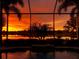 Enjoy beautiful sunsets over the water from this pool with a screened enclosure at 4714 Seneca Park Trl, Bradenton, FL 34211
