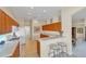 Bright kitchen featuring breakfast bar, pantry, and plenty of natural light at 5179 Cantabria Crst, Sarasota, FL 34238