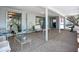 Covered patio featuring comfortable seating and a view of the outdoors, creating a relaxing atmosphere at 5572 Shadow Lawn Dr, Sarasota, FL 34242