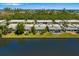 Aerial view of waterfront homes and canal access at 564 Spanish N Dr, Longboat Key, FL 34228