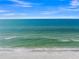 Beautiful beach view with clear blue water and clear sky at 564 Spanish N Dr, Longboat Key, FL 34228