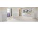 Open-concept living room with an adjoining bathroom and a view of the sunroom at 564 Spanish N Dr, Longboat Key, FL 34228