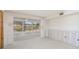 Bright living room with an adjoining sunroom at 564 Spanish N Dr, Longboat Key, FL 34228