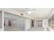 Spacious living room with ceiling fans and closet area at 564 Spanish N Dr, Longboat Key, FL 34228