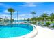 Pool featuring lounge chairs, white fence, and waterfront views at 564 Spanish N Dr, Longboat Key, FL 34228