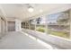 Bright sunroom featuring lots of windows and views of the waterway at 564 Spanish N Dr, Longboat Key, FL 34228