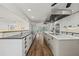 Spacious kitchen with a center island and modern appliances, perfect for cooking and entertaining at 6103 6Th Nw Ave, Bradenton, FL 34209