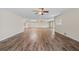 Large living room featuring natural light, ceiling fans, and abundant floor space for customization at 6103 6Th Nw Ave, Bradenton, FL 34209