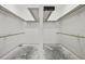 Unfinished walk-in closet with clothes racks and shelving, ready to be customized for your needs at 6103 6Th Nw Ave, Bradenton, FL 34209