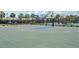 Community basketball court featuring full court, backboard, and fencing at 6528 166Th E Pl, Parrish, FL 34219