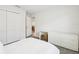 Bright bedroom showcasing modern furniture, light colored carpet, and an ensuite bathroom at 6528 166Th E Pl, Parrish, FL 34219