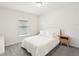 Cozy bedroom featuring plush carpet, soft window light, and stylish bedside tables at 6528 166Th E Pl, Parrish, FL 34219