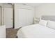 Simple bedroom featuring a comfy bed, closet, and soft colored carpet at 6528 166Th E Pl, Parrish, FL 34219