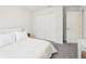 Clean bedroom featuring a comfortable bed, closet, and carpeted floors at 6528 166Th E Pl, Parrish, FL 34219