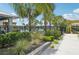 View of the community pool area showcasing the landscaping and seating at 6528 166Th E Pl, Parrish, FL 34219