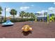 Community playground with swings, slides, and climbing features at 6528 166Th E Pl, Parrish, FL 34219