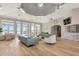 Bright and airy lounge area with tile floors, comfortable seating, and large windows providing a relaxing atmosphere at 6845 74Th Street E Cir, Bradenton, FL 34203