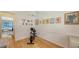Bright bedroom featuring hardwood floors, natural light, and ample space at 7604 Weeping Willow Cir, Sarasota, FL 34241