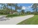View of the house and driveway at 7604 Weeping Willow Cir, Sarasota, FL 34241