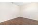 Empty bedroom with hardwood floors, and white walls at 7727 Heyward Cir, University Park, FL 34201