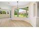 Bright dining area with large bay window overlooking the backyard at 7727 Heyward Cir, University Park, FL 34201