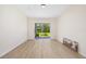 Bright room with sliding glass doors that open to the backyard at 7727 Heyward Cir, University Park, FL 34201