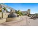 Beautiful courtyard featuring a tiered fountain, outdoor seating and lush landscaping with palm trees at 800 N Tamiami Trl # 405, Sarasota, FL 34236