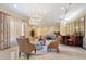 Comfortable resident lounge with modern lighting, stylish furniture, and a bar area at 800 N Tamiami Trl # 405, Sarasota, FL 34236