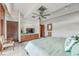 The main bedroom offers neutral walls, wood floors, and an ensuite bathroom at 804 N Shore Dr, Anna Maria, FL 34216