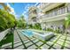 Inviting backyard pool and spa area, perfect for relaxation and entertainment at 804 N Shore Dr, Anna Maria, FL 34216