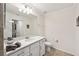 Bright bathroom features a white vanity with a solid surface countertop and tile floors at 850 Tidewater Shores Loop # 102, Bradenton, FL 34208