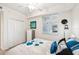 Comfortable bedroom with closet doors and a window at 850 Tidewater Shores Loop # 102, Bradenton, FL 34208