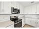 Featuring stainless steel appliances, white cabinets and quartz countertops at 850 Tidewater Shores Loop # 102, Bradenton, FL 34208