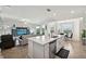 Spacious open floor plan features the living room, kitchen and dining area at 850 Tidewater Shores Loop # 102, Bradenton, FL 34208