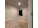 Cozy bedroom with carpet flooring, a window with curtain, and a neutral color scheme at 8706 Arrow Creek Dr, Parrish, FL 34219