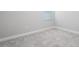 Bedroom with window, carpet, and baseboards at 8706 Arrow Creek Dr, Parrish, FL 34219