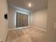 Empty bedroom features plush carpet, a neutral color scheme, and a window with privacy curtains at 8706 Arrow Creek Dr, Parrish, FL 34219